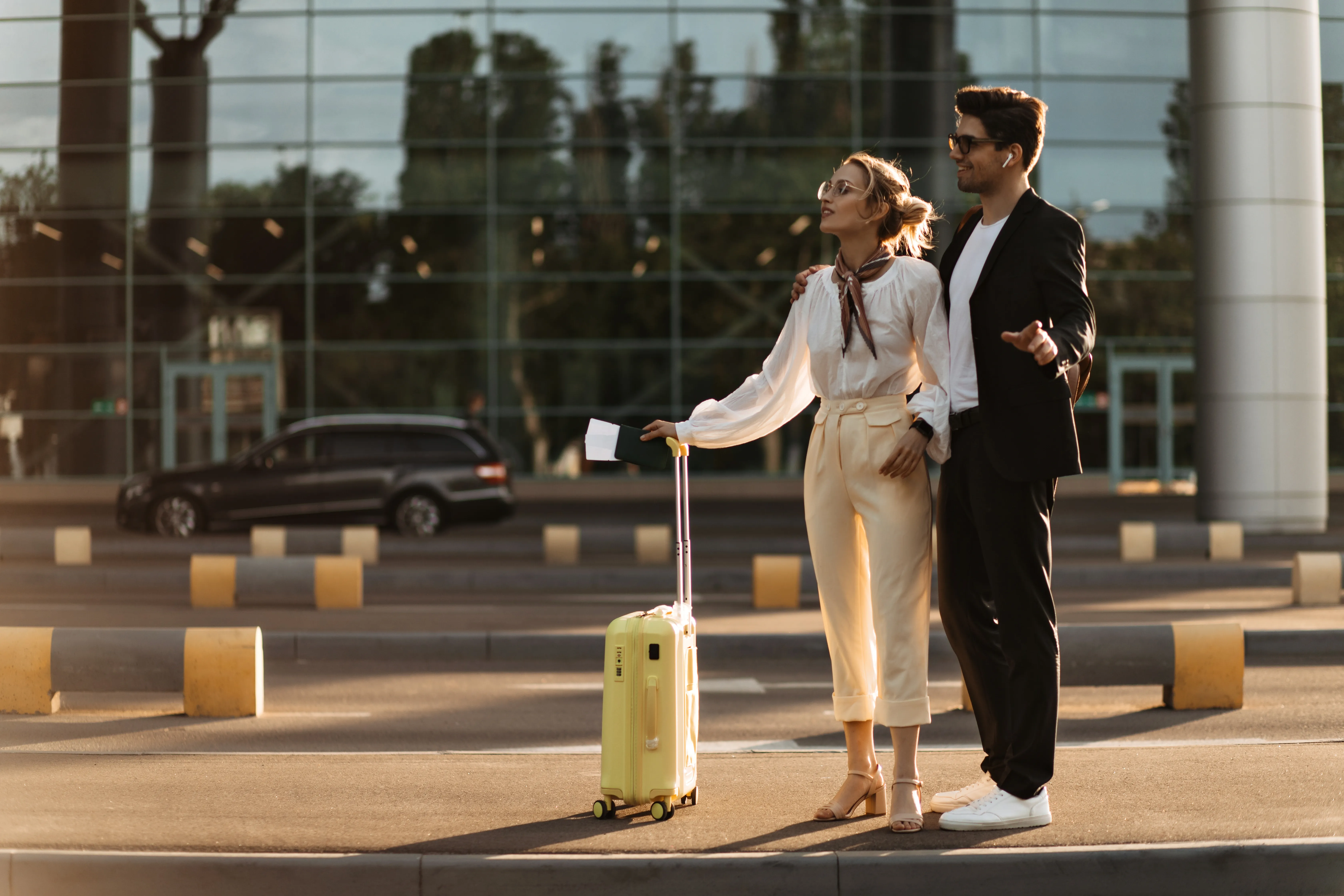 Travelers waiting for limo outside an Burbank airport